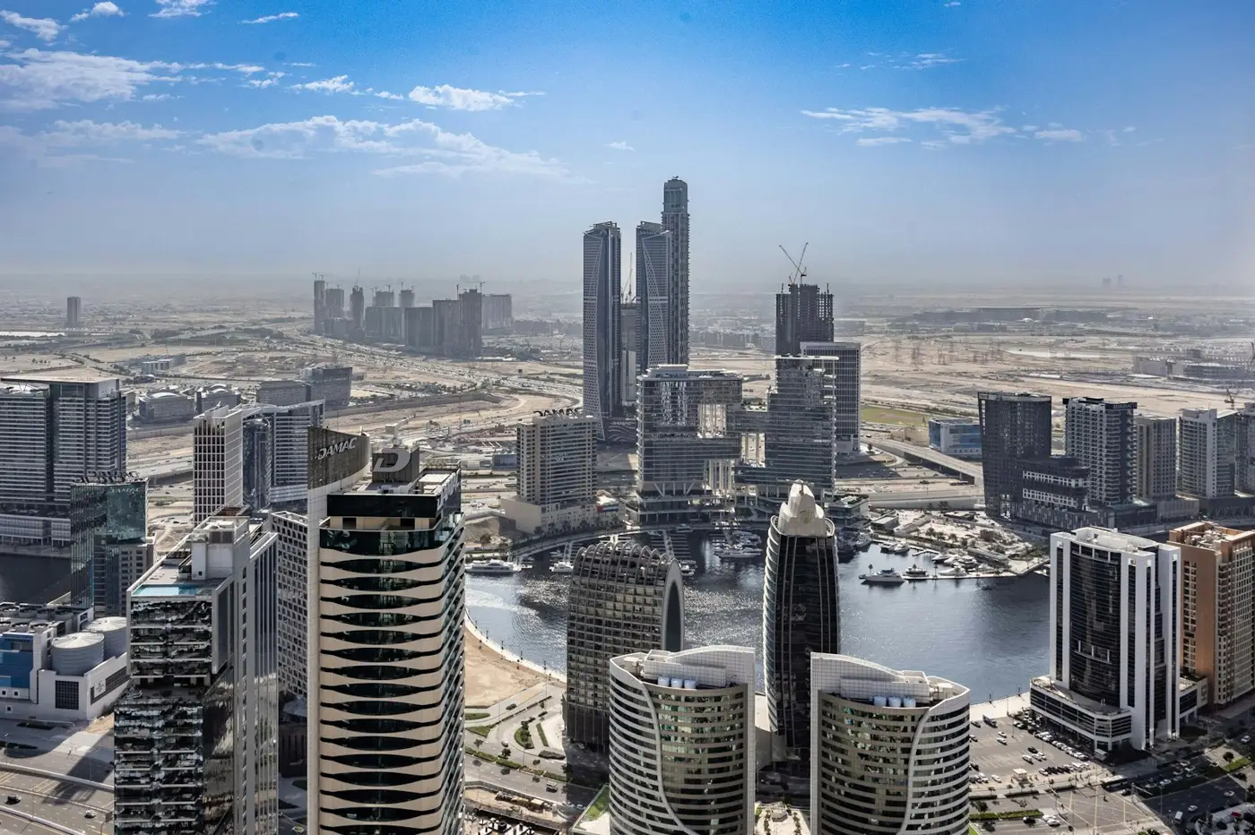 Business Bay vs Downtown Dubai: Business Bay towers and the canal seen from above