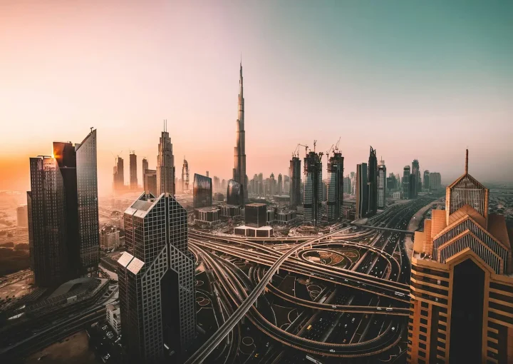 Dubai escrow account: skyline with the Burj Khalifa above a Dubai highway interchange