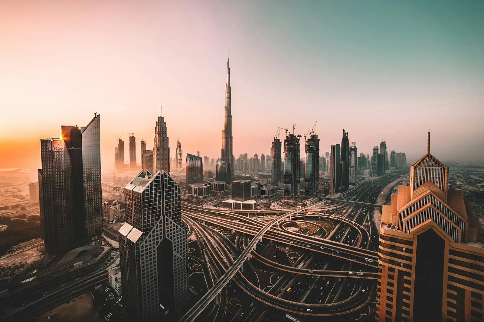 Dubai escrow account: skyline with the Burj Khalifa above a Dubai highway interchange