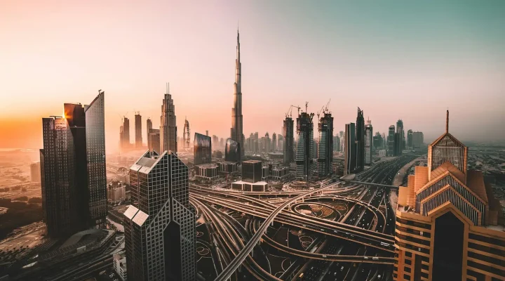Mortgage in Dubai for non-residents: Burj Khalifa and Dubai skyline above a highway