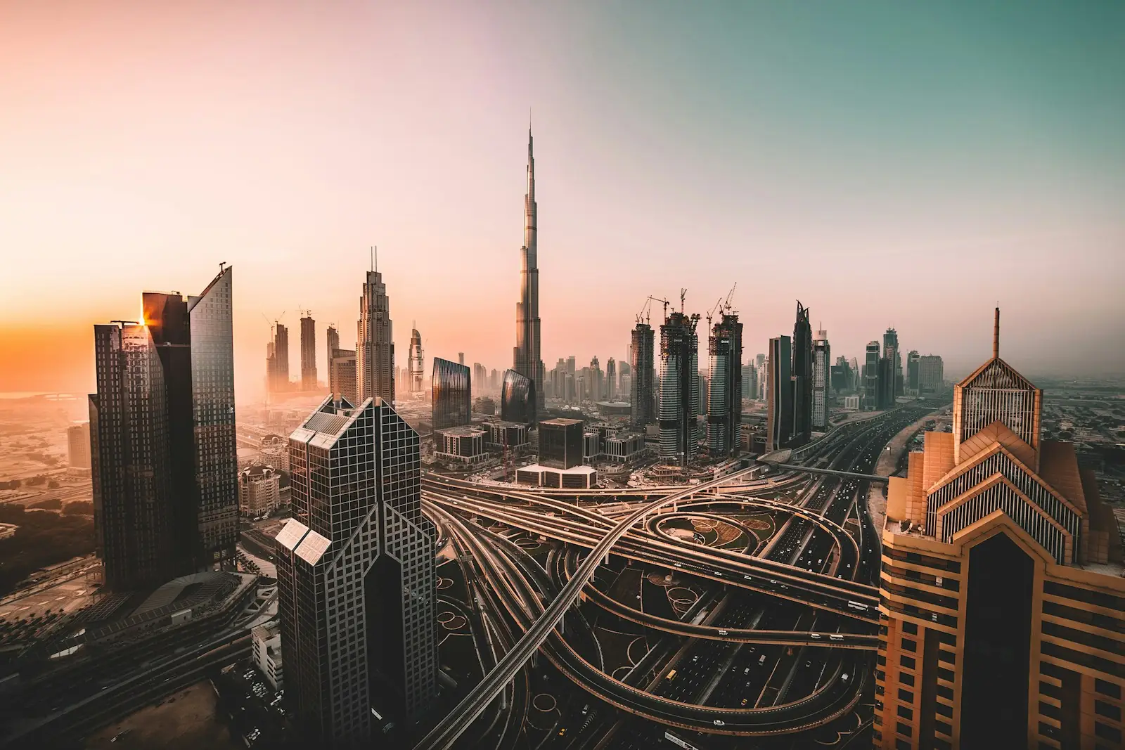 Mortgage in Dubai for non-residents: Burj Khalifa and Dubai skyline above a highway
