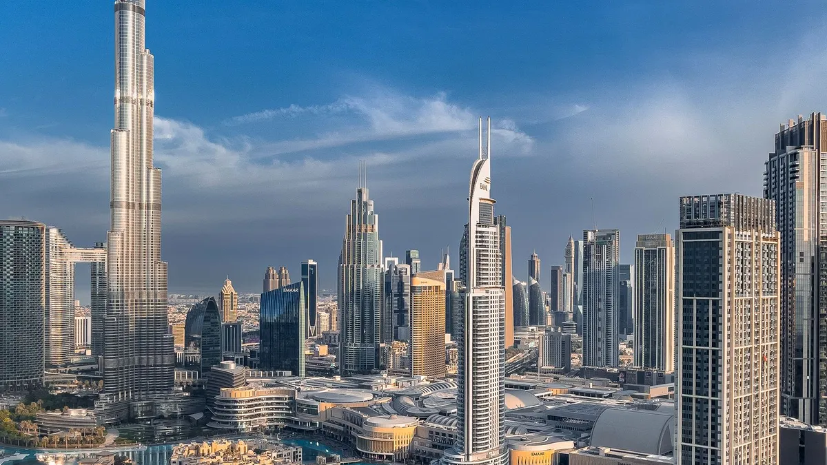 UAE economy forecast: Dubai skyline with the Burj Khalifa at sunset