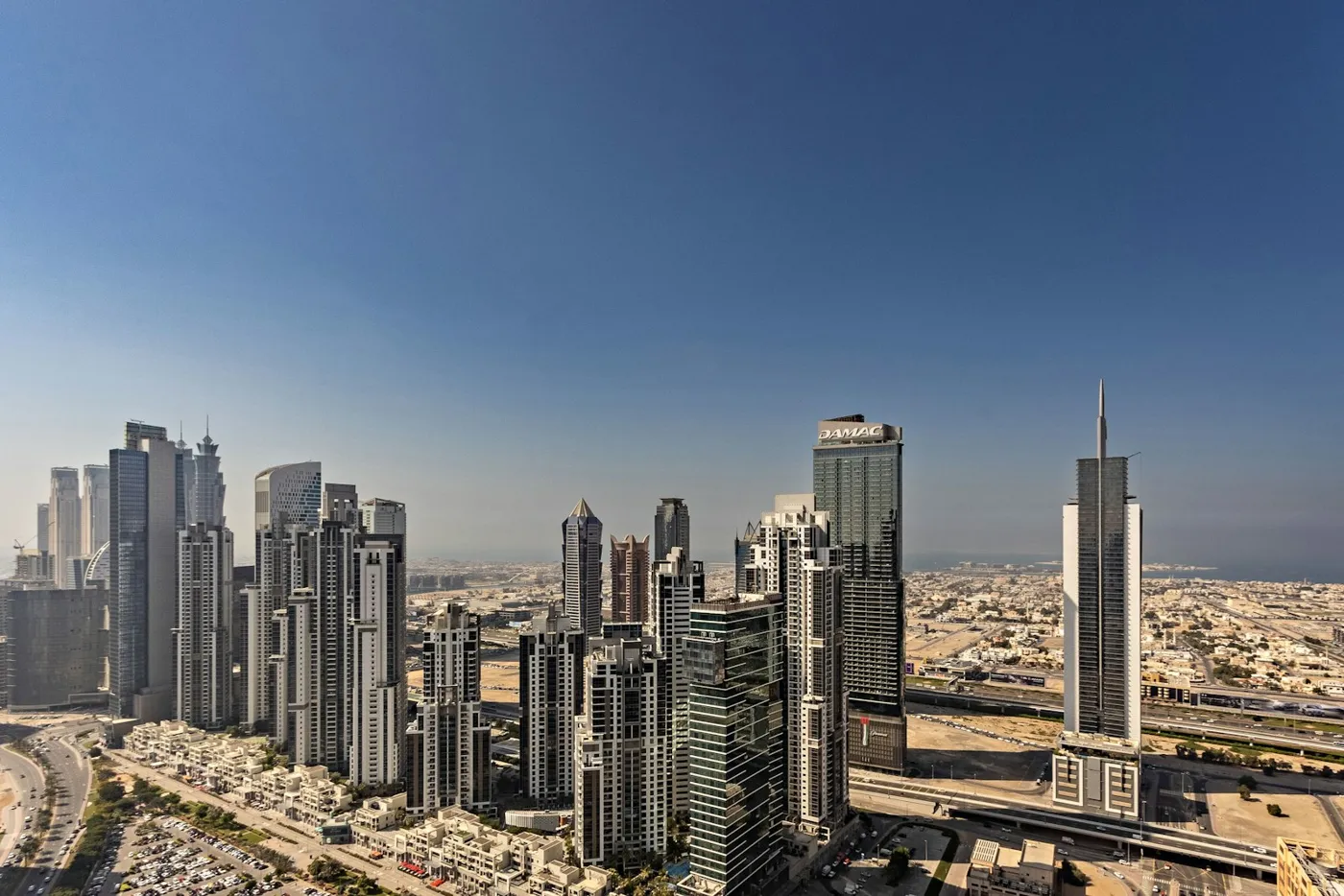 Dubai home sales value falls 46% in Q3 2026: Business Bay and Downtown towers skyline