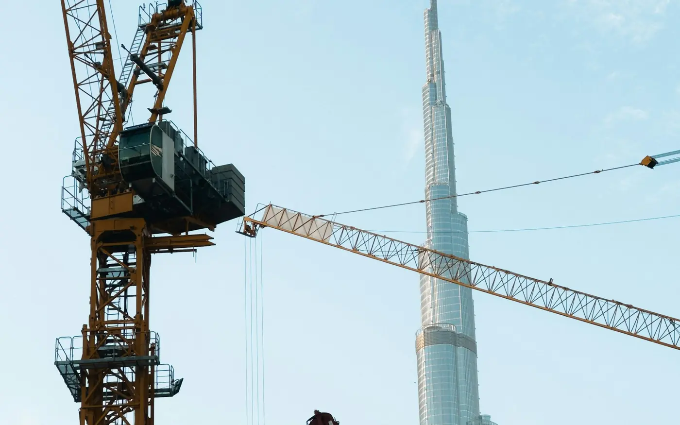 Dubai Dh2.1 trillion projects: construction cranes beside Burj Khalifa in Downtown Dubai