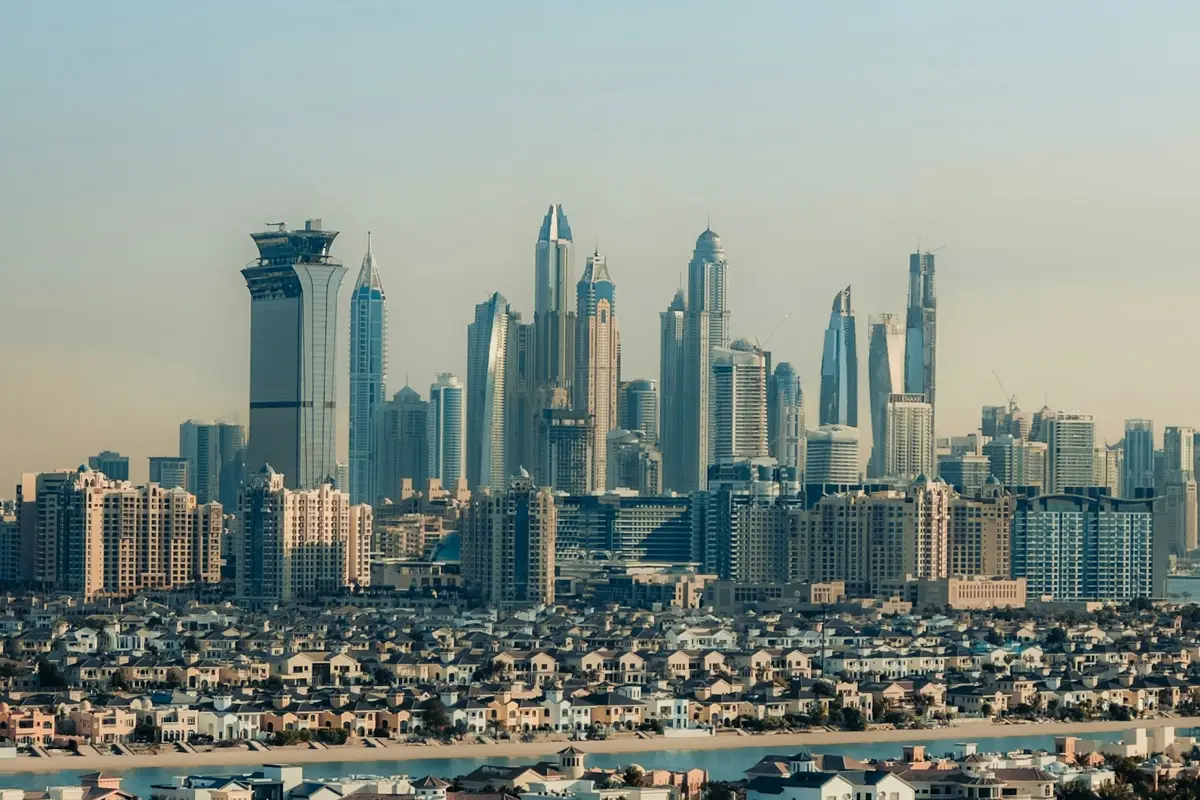 Dubai waterfront villas and the Marina skyline across the sea