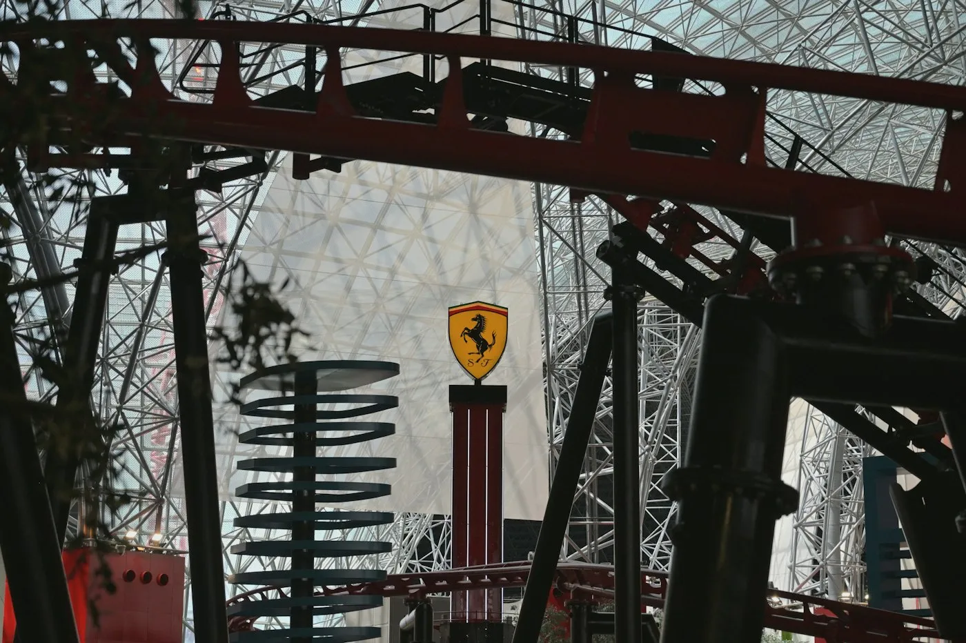 Yas Island property: roller coaster and Ferrari sign inside a Yas Island theme park